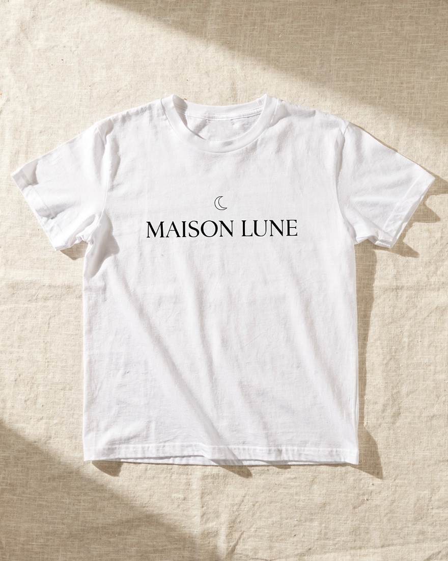 Flat lay of a white MAISON LUNE logo t-shirt
